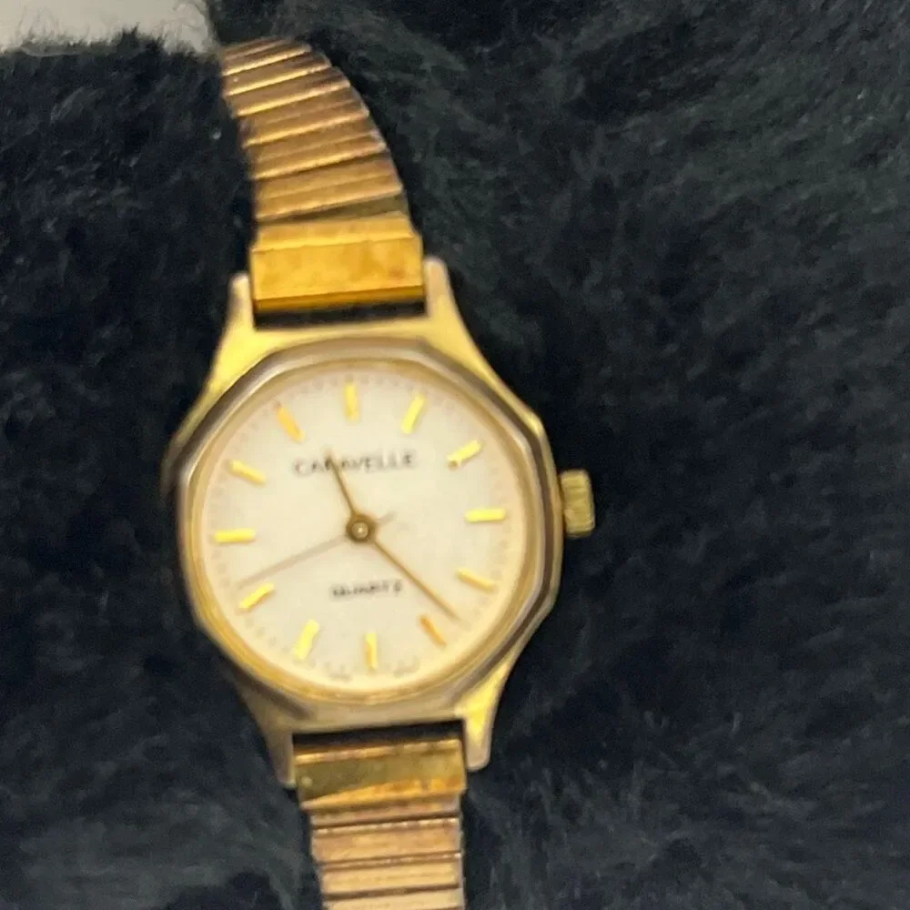 Caravelle Women's‎ Gold Tone Quartz Stainless Steel Back Stretch Band Wristwatch